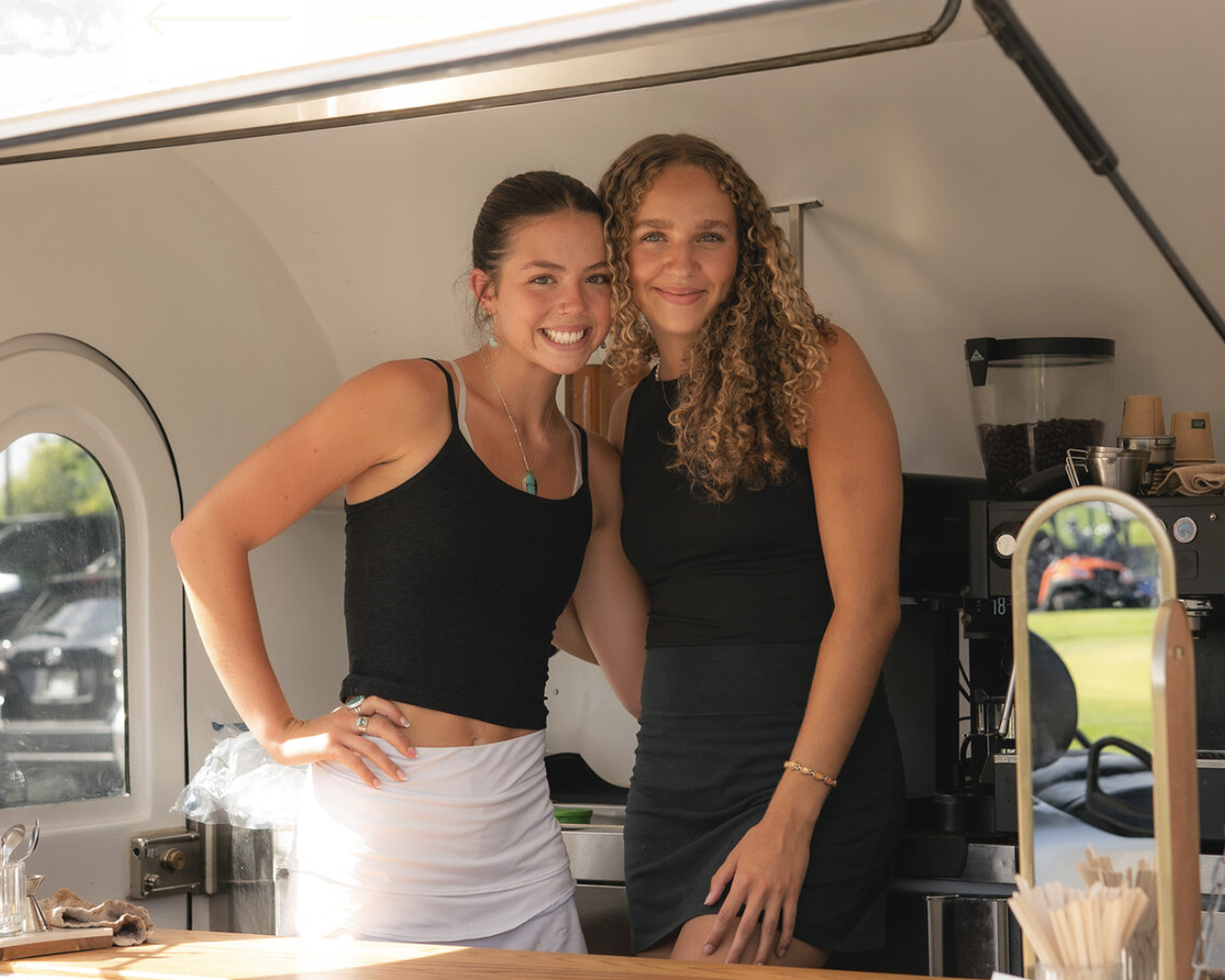 The With Honey team inside their coffee trailer at Idaho Air